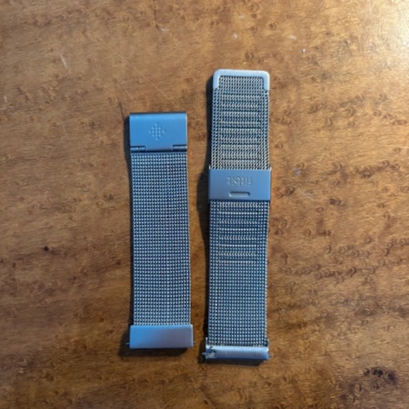 FitBit Accessories - Fitbit Versa Stainless Steel band plus 5 silicone bands.